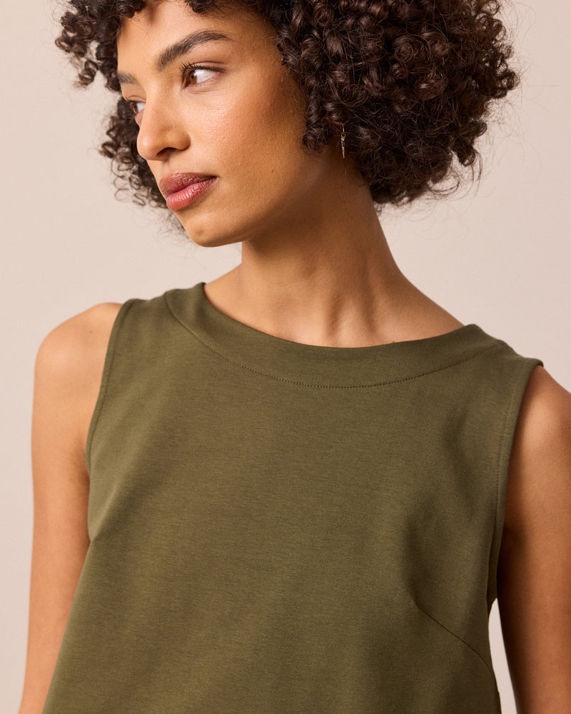 model wears esme light olive jersey top