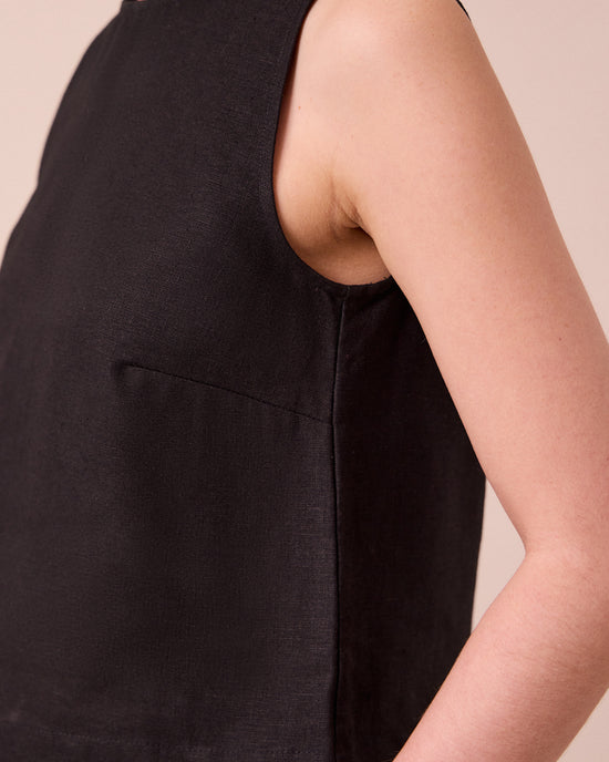 model wears esme black linen top