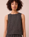 model wears esme black and ecru stripe linen top