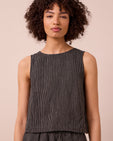 model wears esme black and ecru stripe linen top