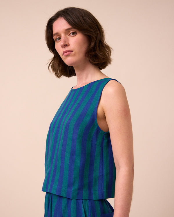 model wears esme house blue stripe linen top