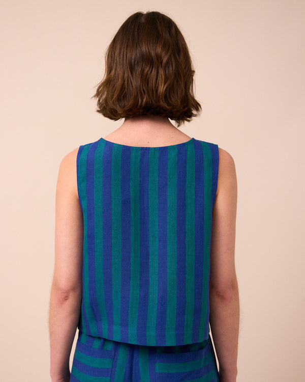 model wears esme house blue stripe linen top