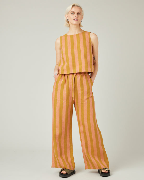 model wears pollen stripe linen lexi trousers