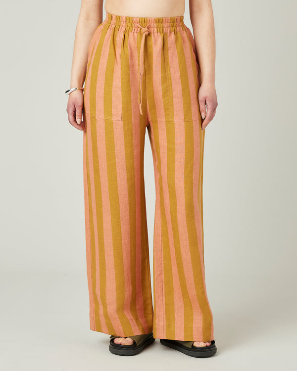 model wears pollen stripe linen lexi trousers front