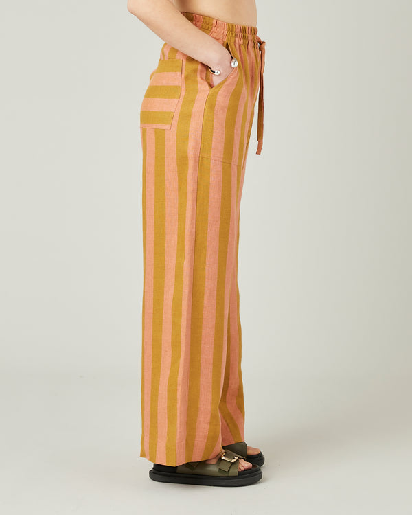 model wears pollen stripe linen lexi trousers right