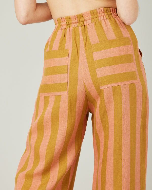 model wears pollen stripe linen lexi trousers