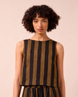 model wears esme rust stripe linen top