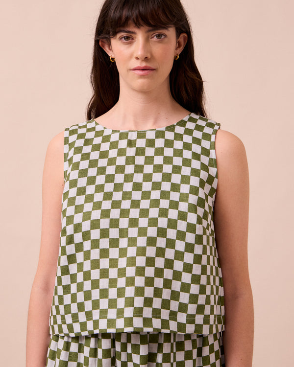 model wears esme sky checkerboard linen top