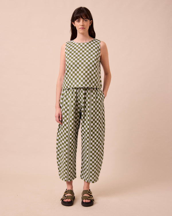model wears esme sky checkerboard linen top