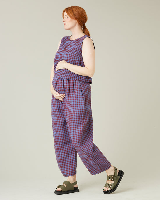 pregnant model wears blueberry check linen esme top