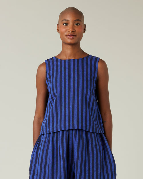 model wears indigo stripe linen esme top