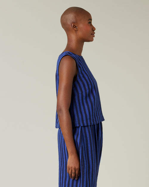 model wears indigo stripe linen esme top