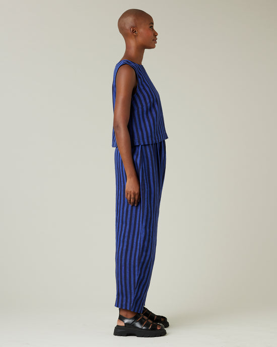 model wears indigo stripe linen mabel trousers