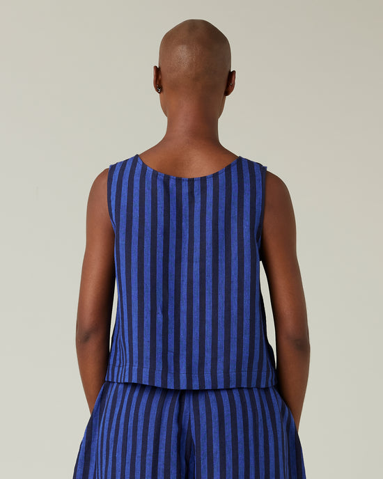 model wears indigo stripe linen esme top