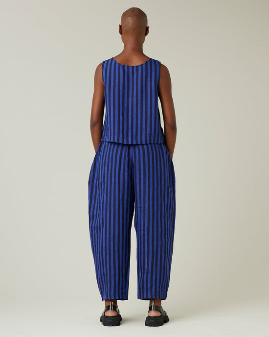 model wears indigo stripe linen mabel trousers