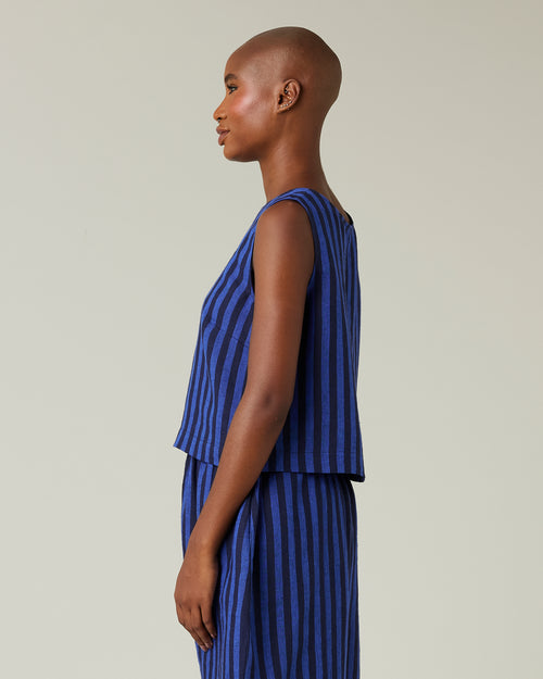 model wears indigo stripe linen esme top