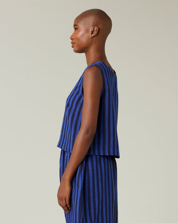 model wears indigo stripe linen esme top
