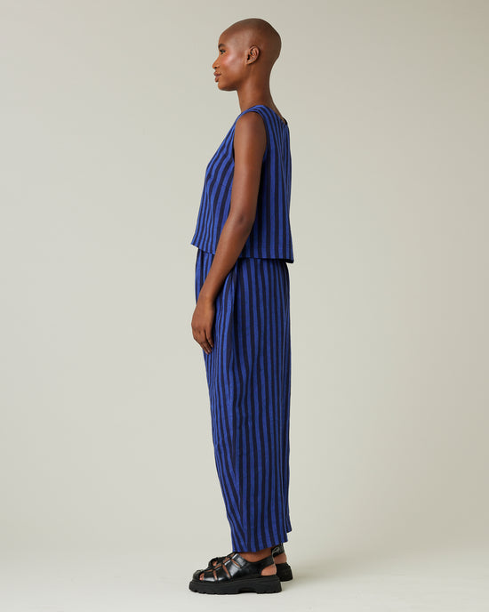 model wears indigo stripe linen mabel trousers