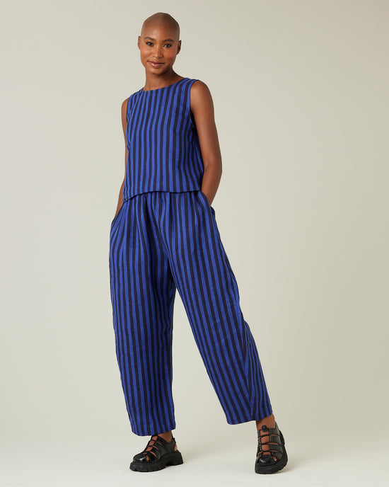 model wears indigo stripe linen esme top