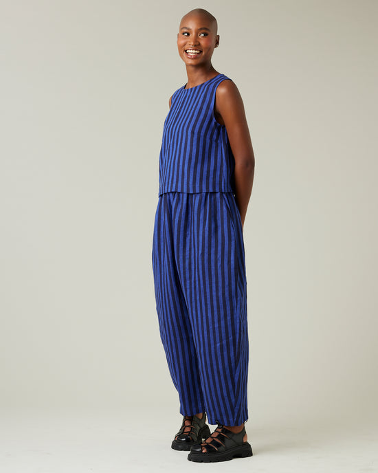 model wears indigo stripe linen esme top