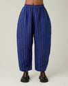 model wears indigo stripe linen mabel trousers from the front