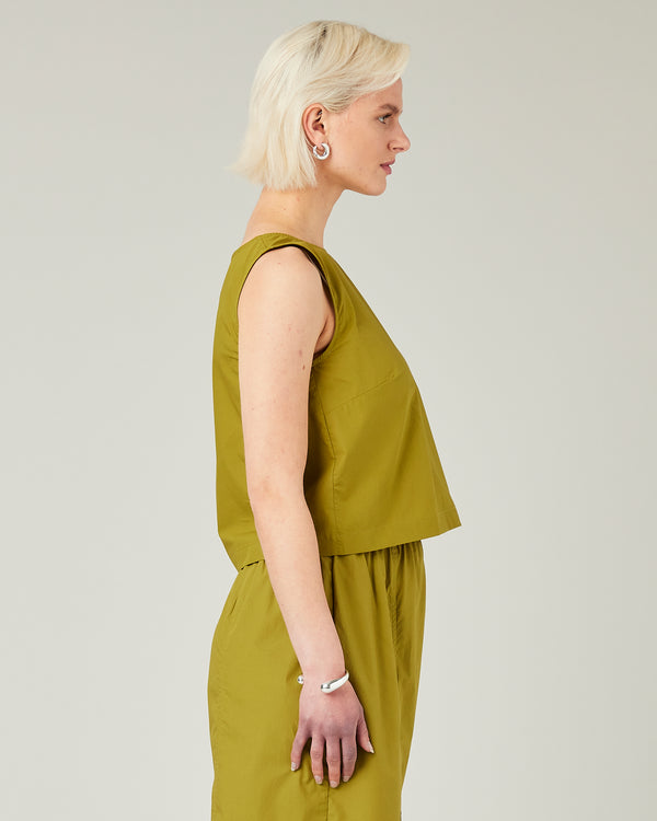 model wears olive poplin esme top