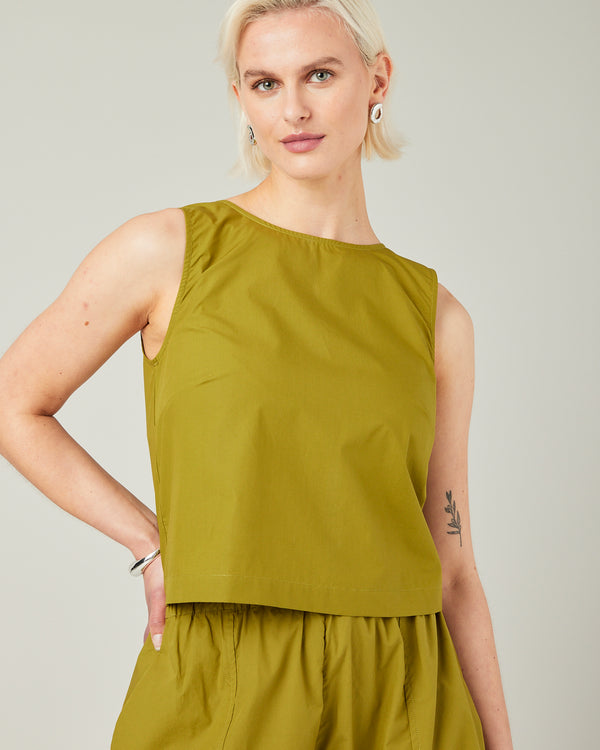 model wears olive poplin esme top
