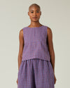 model wears blueberry check linen esme top