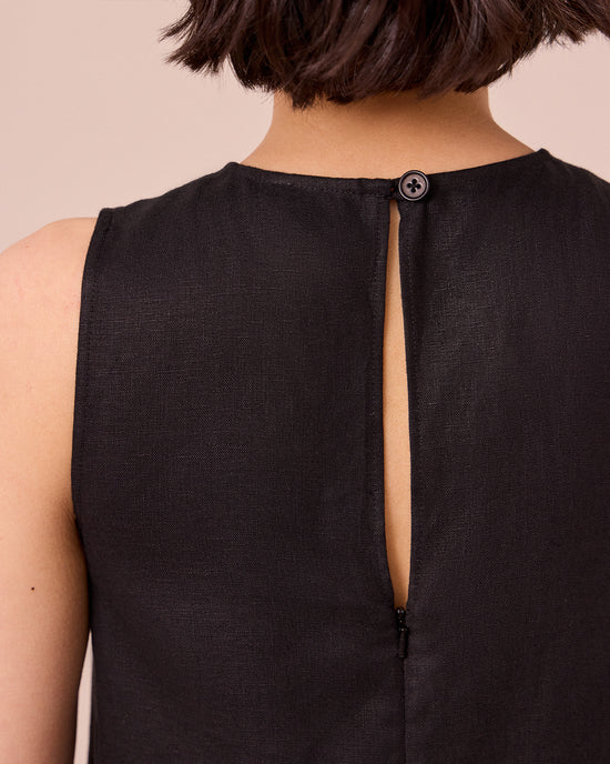 model wears etta black linen dress