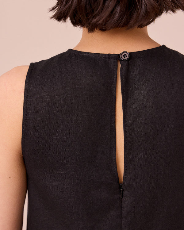 model wears etta black linen dress