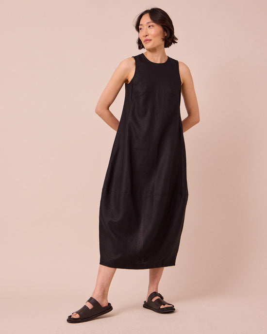 model wears etta black linen dress