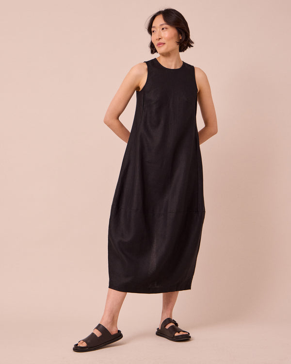 model wears etta black linen dress