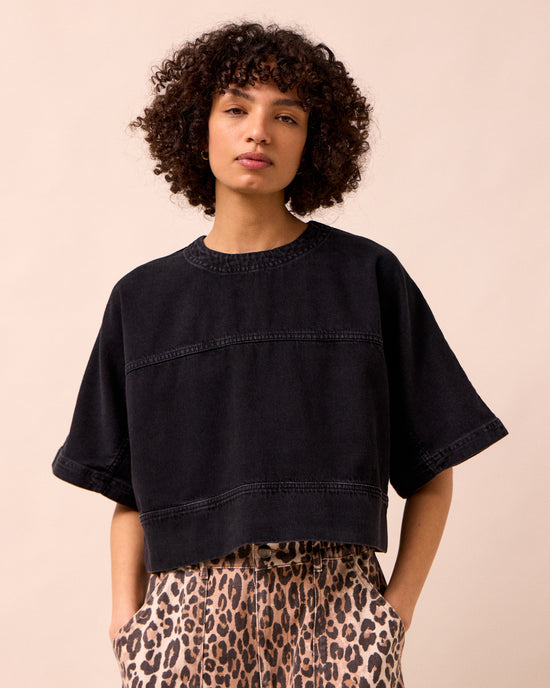 model wears eva washed black denim t shirt