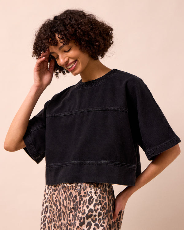 model wears eva washed black denim t shirt