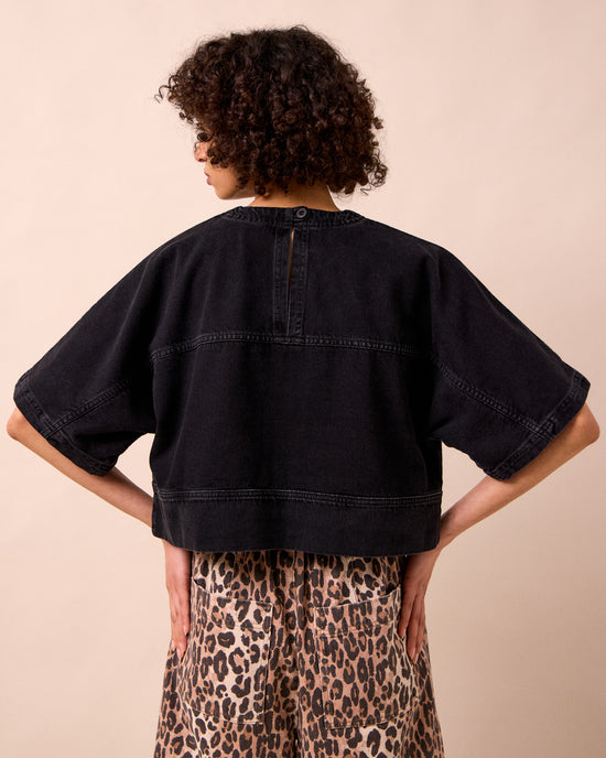 model wears eva washed black denim t shirt