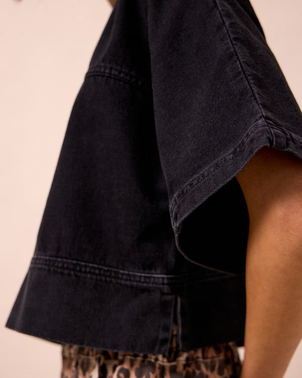 model wears eva washed black denim t shirt