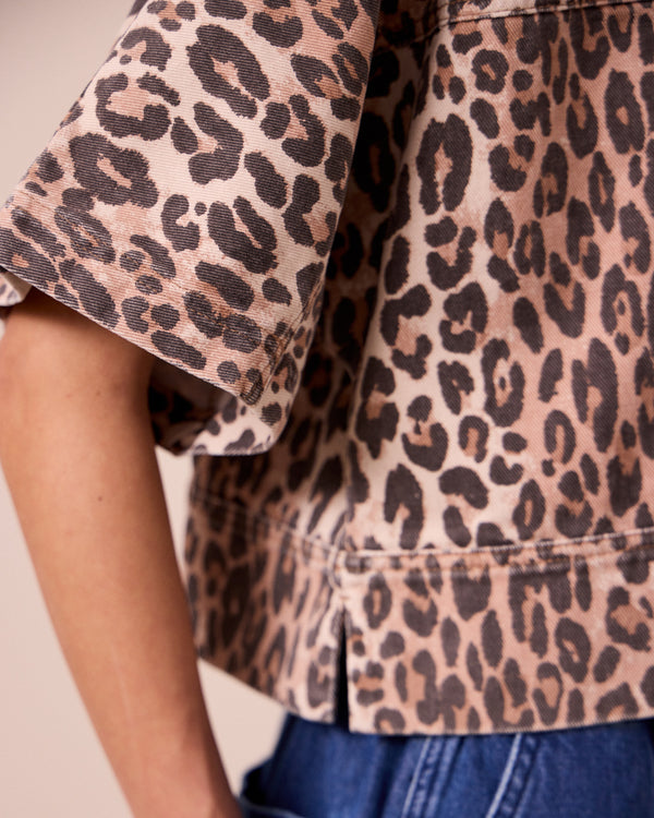 model wears eva leopard print denim top