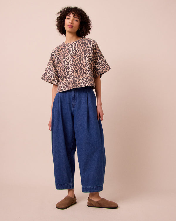 model wears eva leopard print denim top