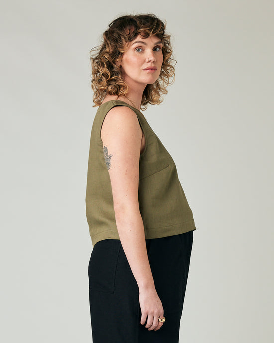 pregnant model wears khaki linen esme top