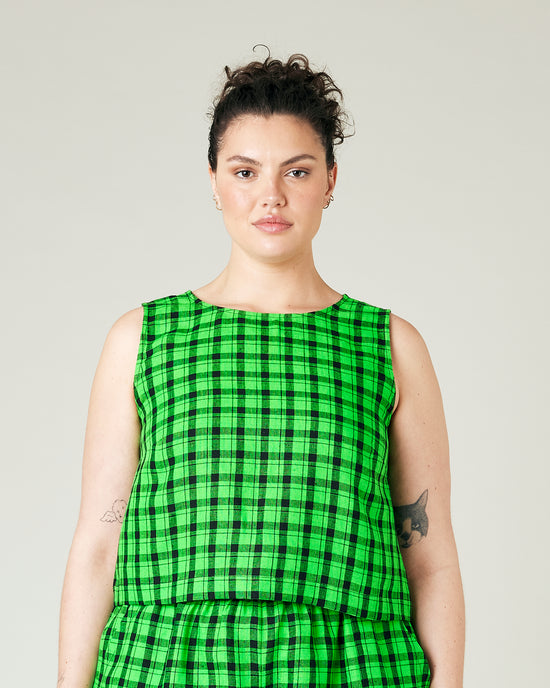 model wears green check linen esme top