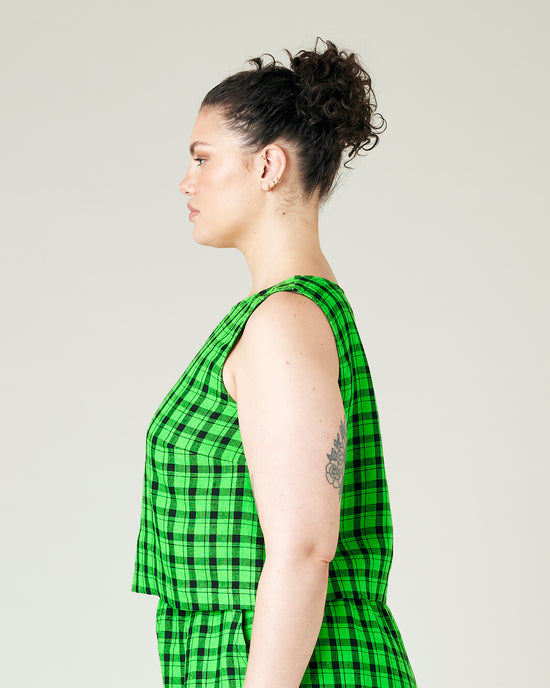 model wears green check linen esme top