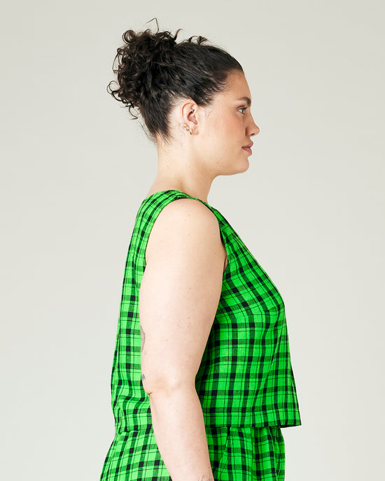 model wears green check linen esme top