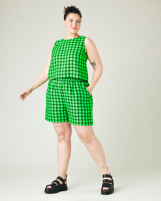 model wears green check linen esme top