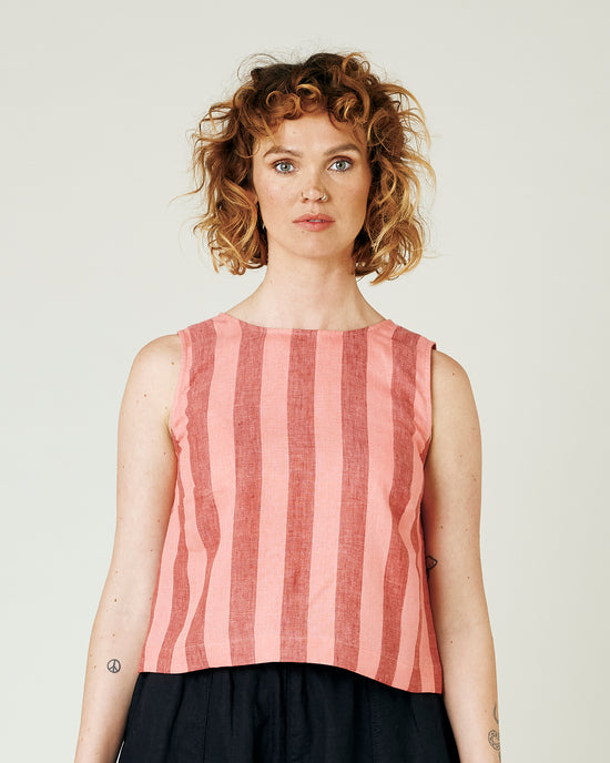 model wears blush stripe linen esme top