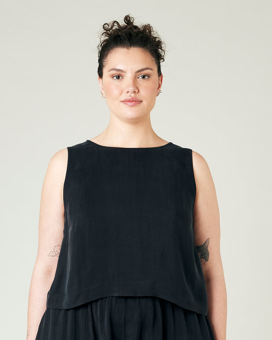 model wears black cupro esme top