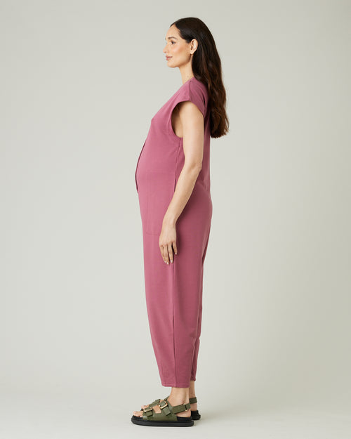 pregnant model wears autumn rose jersey frankie jumpsuit