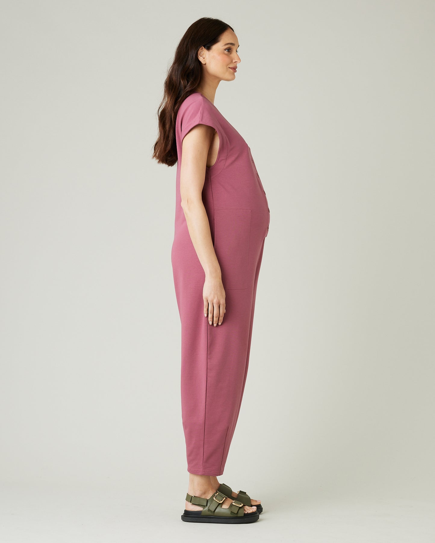 pregnant model wears autumn rose jersey frankie jumpsuit