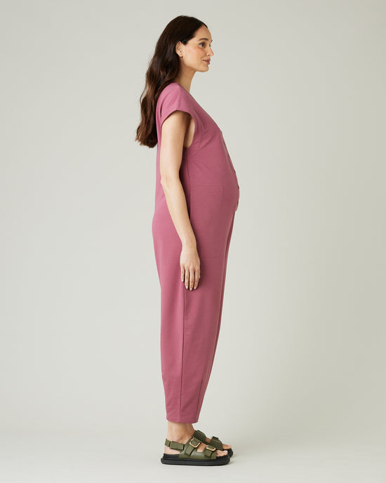 pregnant model wears autumn rose jersey frankie jumpsuit