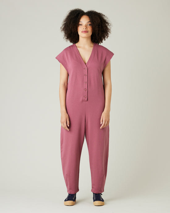 model wears autumn rose jersey frankie jumpsuit