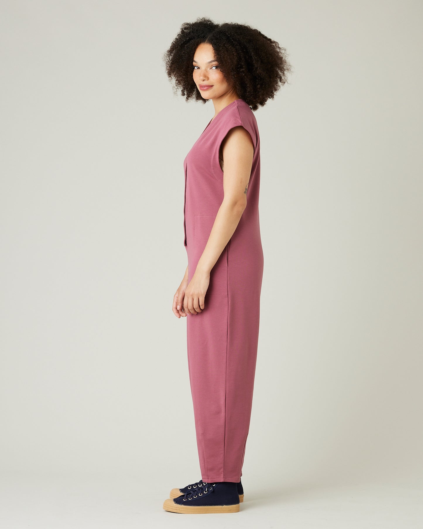 model wears autumn rose jersey frankie jumpsuit